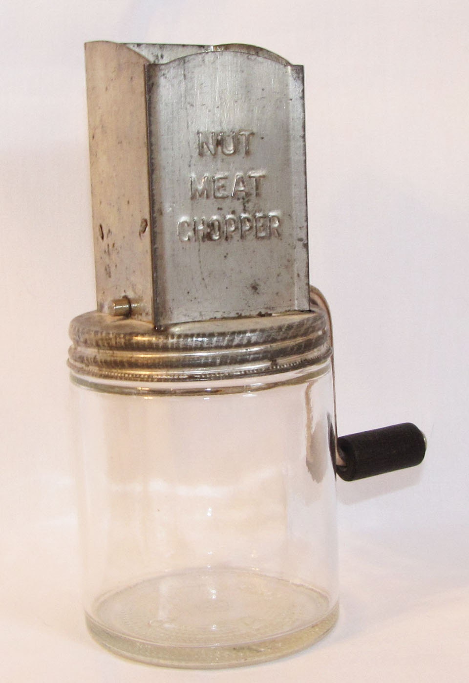 Vintage Nut Meat Chopper on Brockway Glass Co. Jar with black