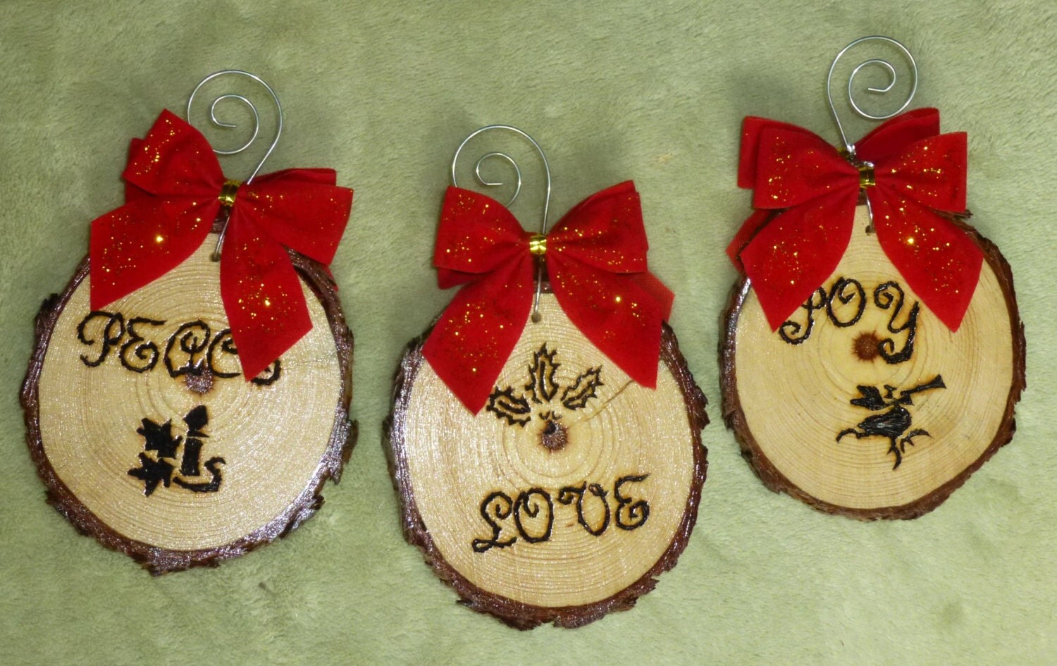 Woodburned pine branch ornaments to adorn your holiday tree with wishes of the season