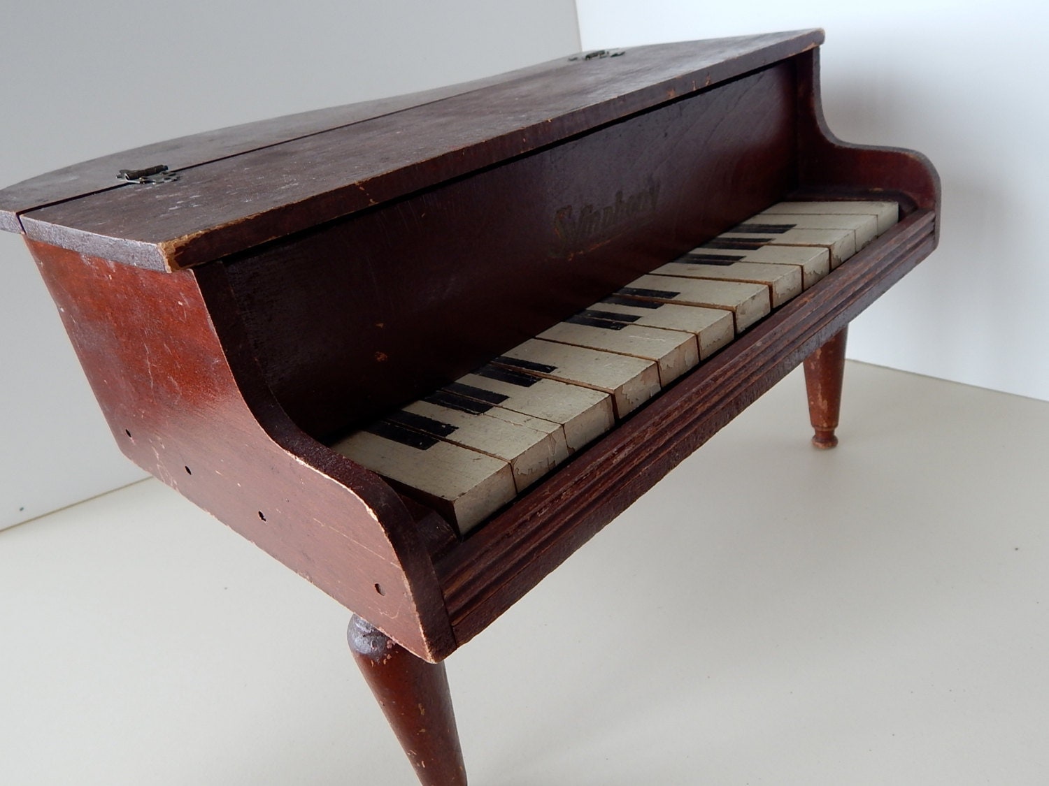 vintage wooden toy piano