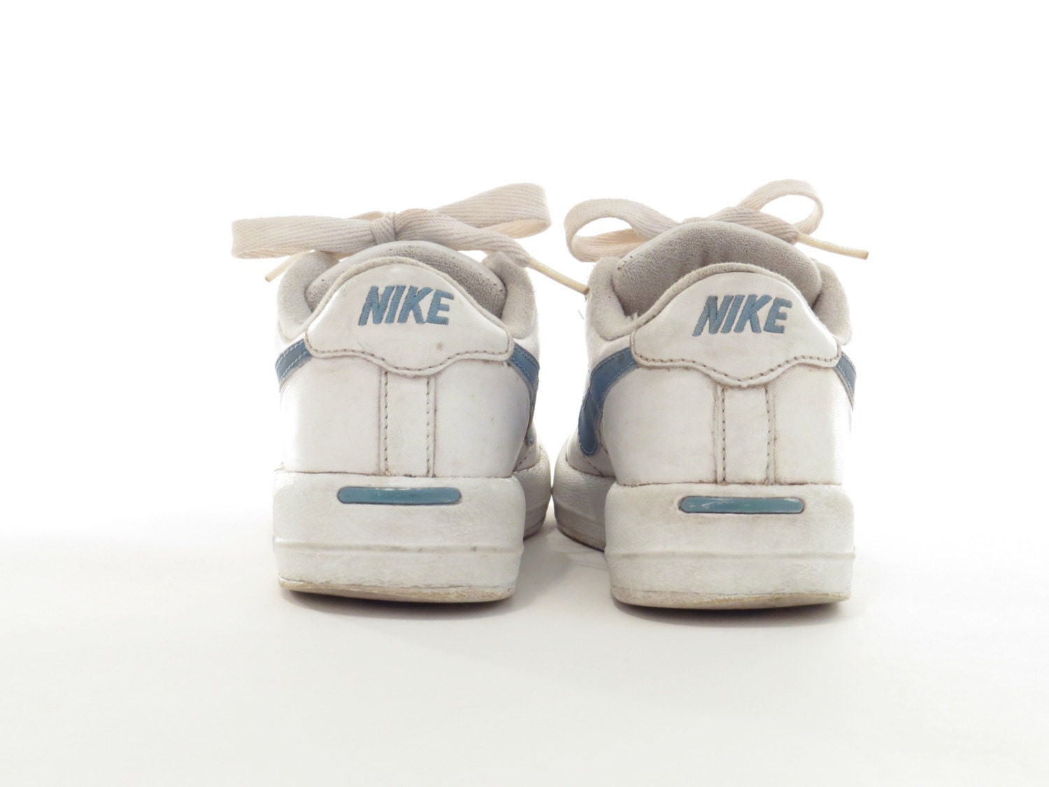 nike white shoes blue swoosh