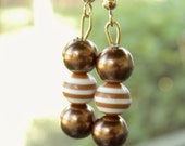 Snazzy Brown Beaded Earrings With A Striped Resin Bead