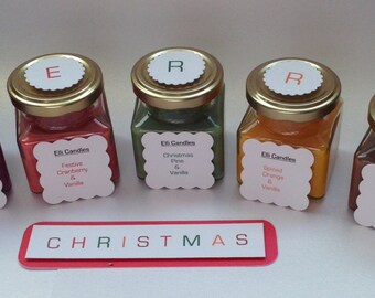 Set of Christmas candles. Square, screw top jars, with a variety of wax and Christmas scent combinations!