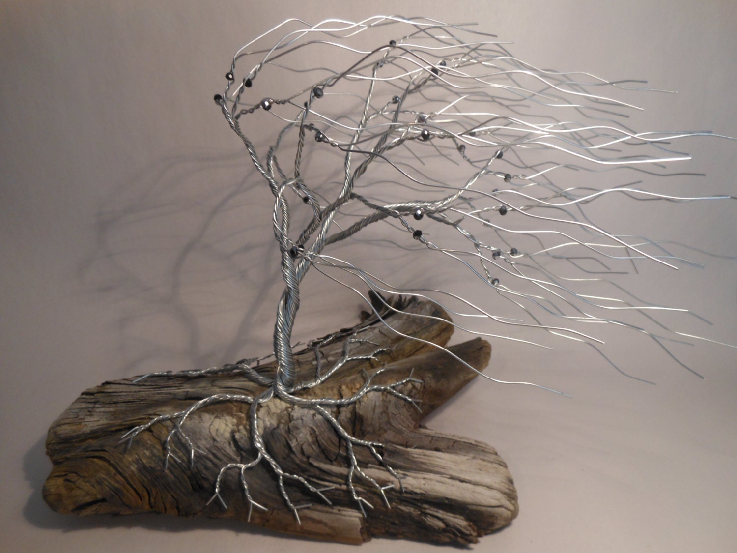 Twisted wire tree on driftwood Sculpture 140828