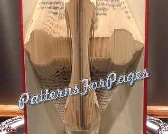 Book folding pattern for a CROSS