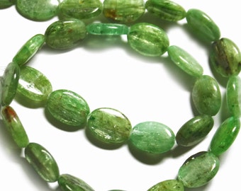 Green kyanite smooth flattened ovals. Approx. 10x14mm. Select a quantity.