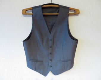 Popular items for light blue vest on Etsy