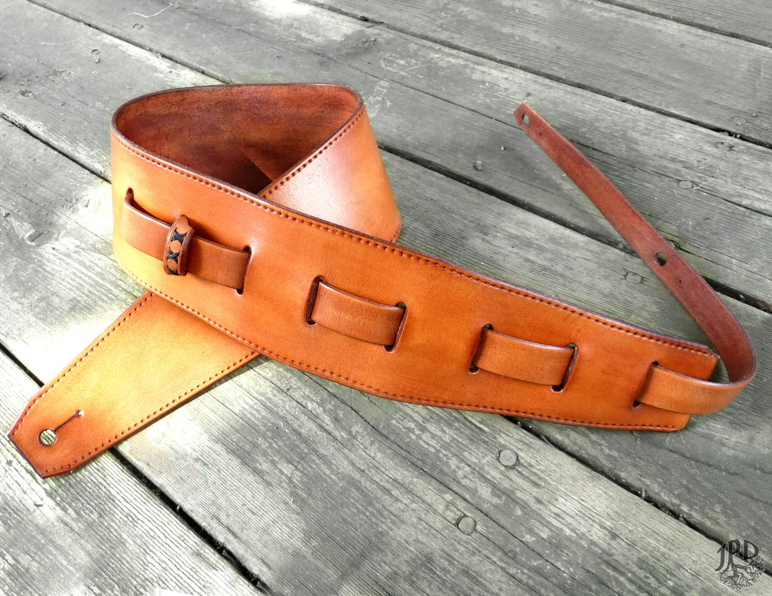 leather bag with guitar strap