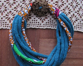 Woolen torchon necklace green oil with African fabric inserts . Unique, original gift idea!