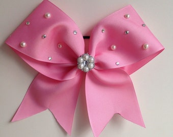 Pink girly-bedazzled bow