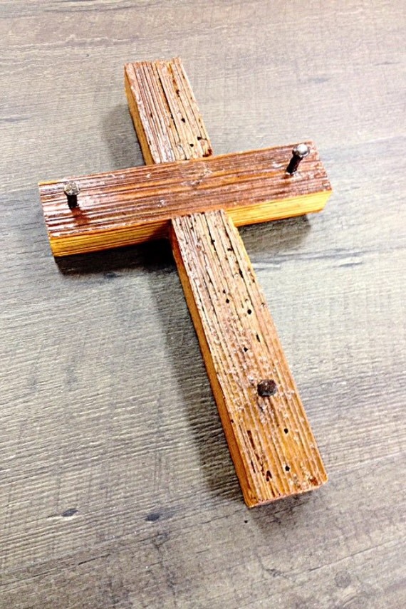 Items similar to Wooden Cross with nails on Etsy