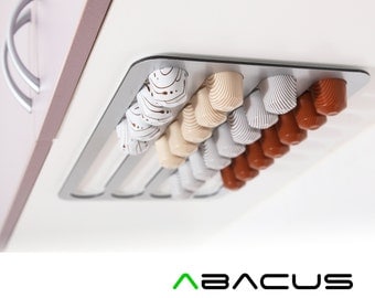 Abacus Pod Rack, a kitchen accessory that holds and dispenses your Nespresso coffee capsules FNS36