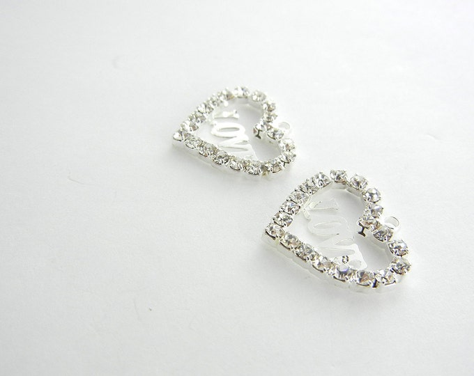 Pair of Small Silver-tone Cut-out Heart Charms with the Word Love