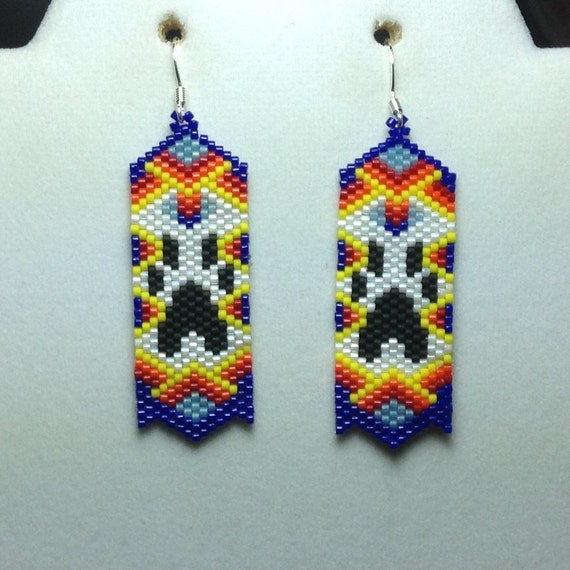 Items similar to Paw Beaded Earrings on Etsy