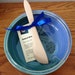 Brie Baker with wooden Brie Spreader and Baked Brie Recipe