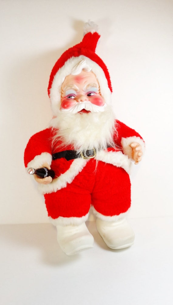 vintage stuffed santa holding coke bottle