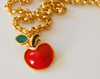 Necklace and apple enamelled pendant in metal gold tone