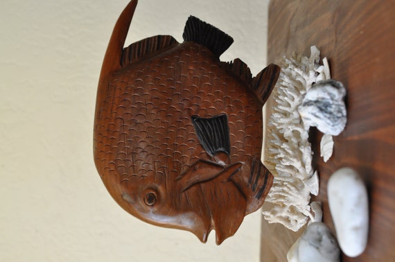 large wooden fish sculpture