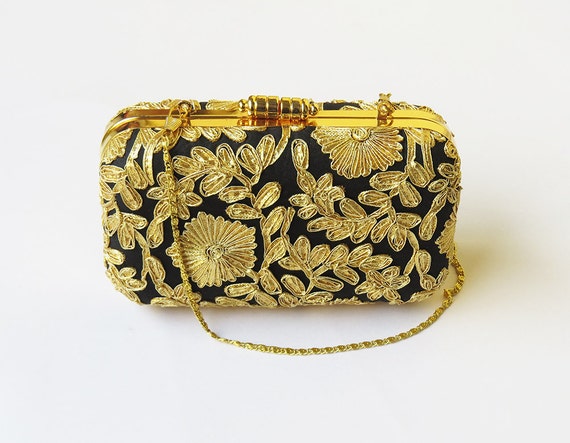 black and gold clutch bags uk