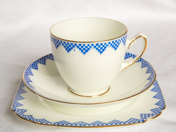 Rare Taylor & Kent bone china cup saucer and plate trio