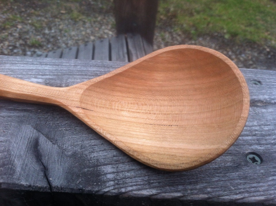 Large hand carved wooden serving spoon.. 1414