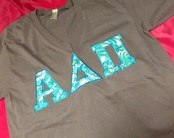 Alpha Delta Pi Lilly V-neck T-Shirt in Size Extra Small (one in ADPi Sorority left) in Size XS otherwise choose Shorley She's a Fox