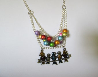 Birds on a branch necklace With Spectra Beads.