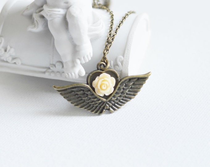 Love inspires // Pendant in the form of a winged heart with a rose made of polymer clay // Love, Beauty, Vintage, Flowers, Heart, Angel