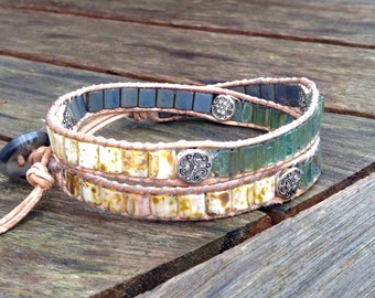 Handwoven Miyuki tila double wrap bracelet. Earthy colors, natural leather trim, adjustable length.