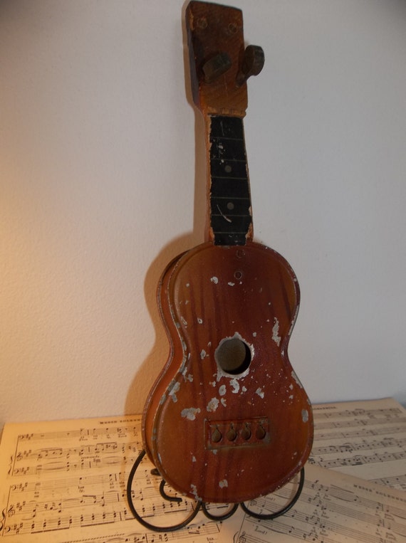 Vintage toy tin guitar