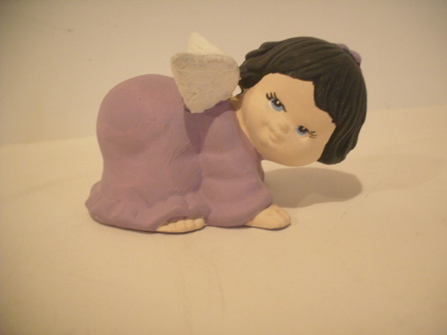 Ceramic Angel, Cherub, Christmas Angel, Crawling wearing purple