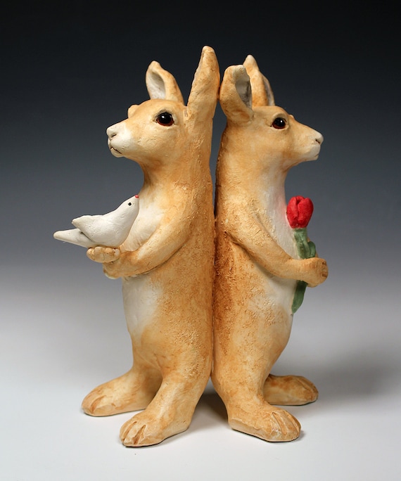 2 ceramic hares tan and white ceramic hare sculpture