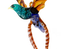 tropical bird figurines