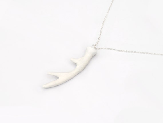 https://www.etsy.com/uk/listing/83632562/white-stag-antler-necklace-single-antler