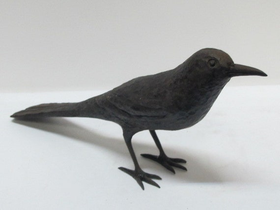 iron bird figurine