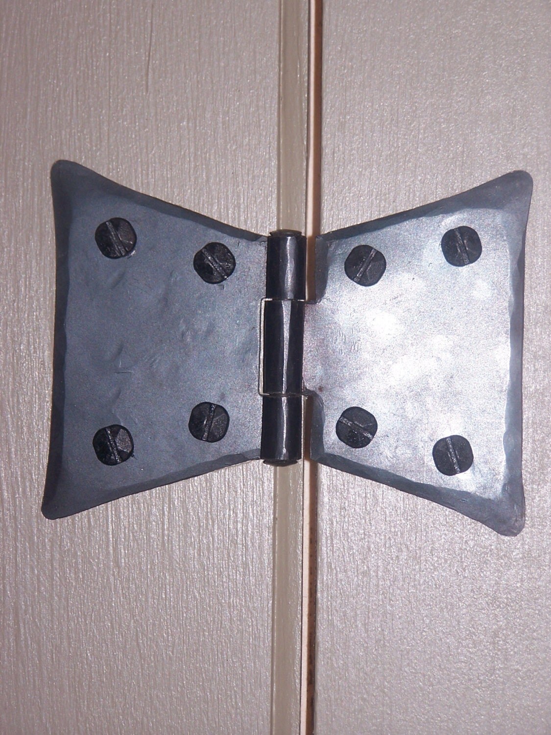 Hand 3 Butterfly Hinge. steel with