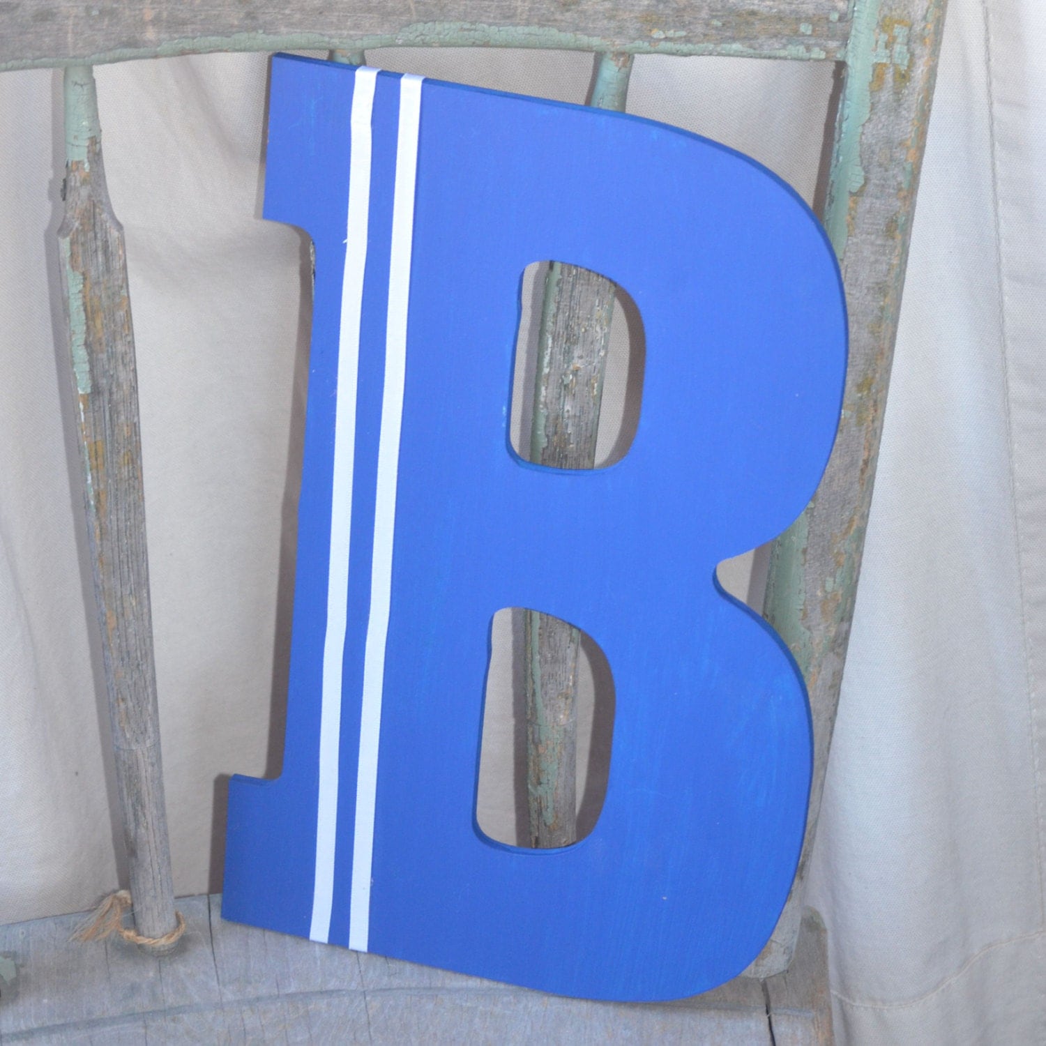 Navy Blue Letter B With White Ribbons Wall Decoration