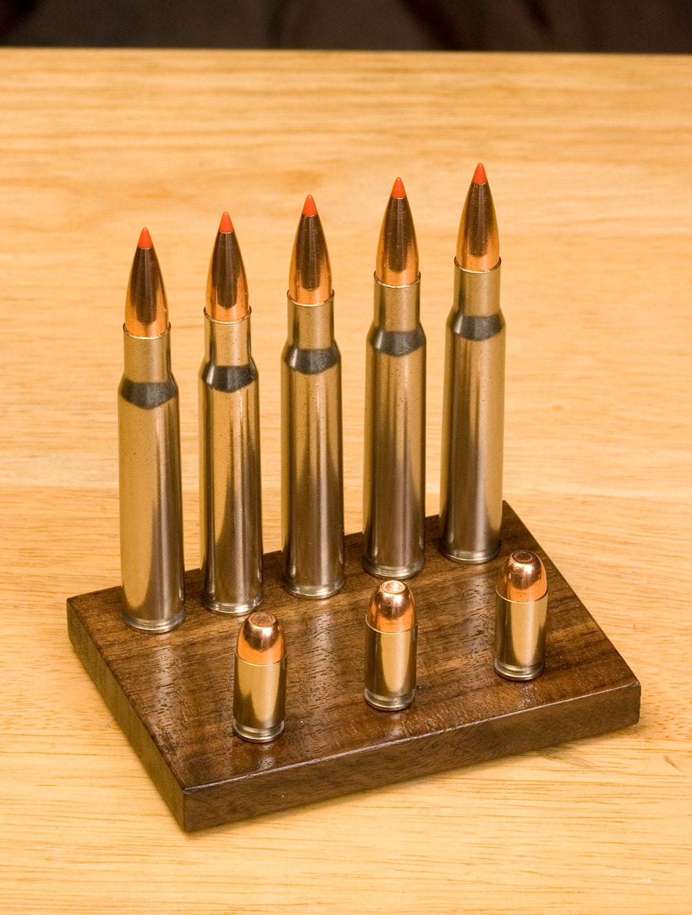 Business card holder with rifle and pistol cartridges