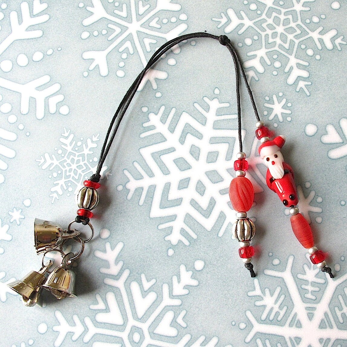 Beaded Christmas Ornament: Lampwork Glass Santa Claus Decoration with Silver Bells. Red Glass Beads. Antiqued Silver Beads