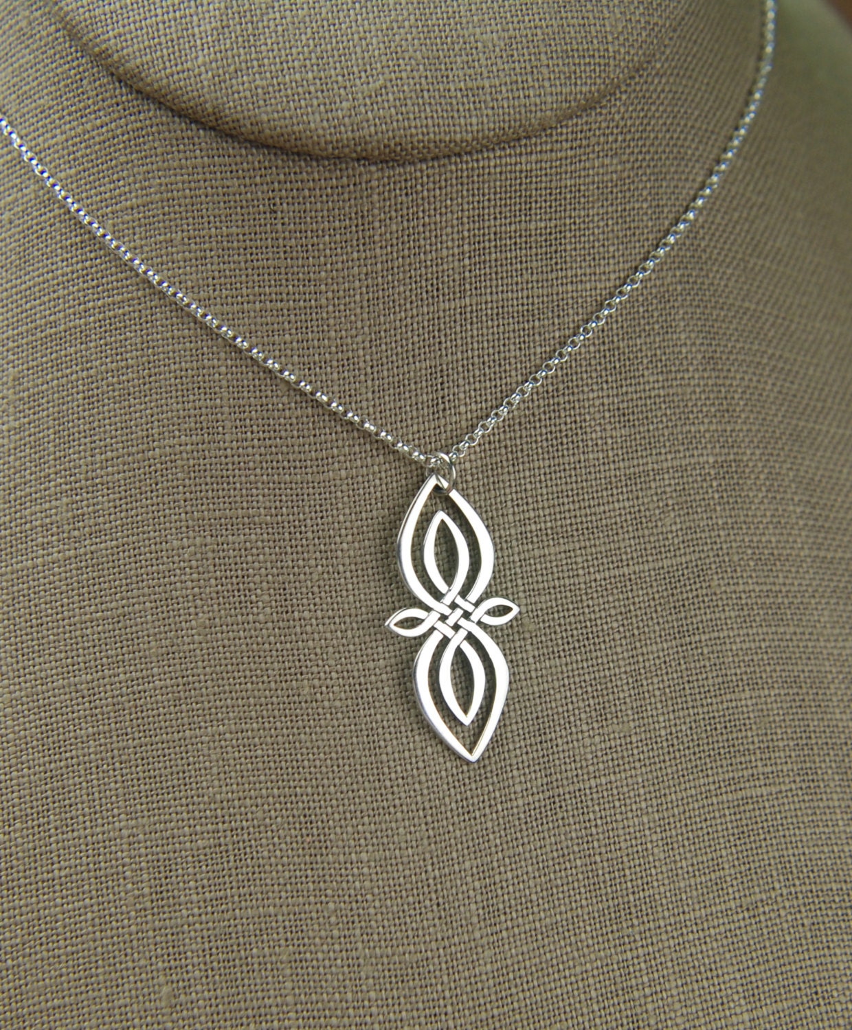 Celtic knot infinity pendant necklace in sterling silver
