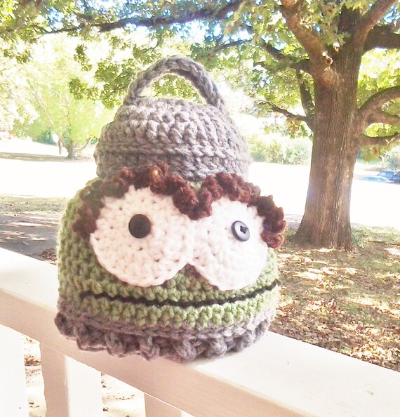 Oscar the Grouch with the Garbage Can Lid