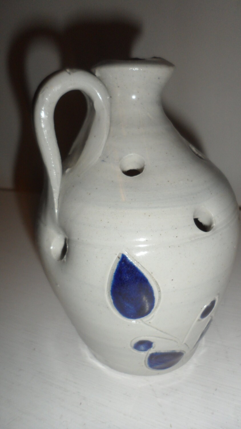 williamsburg pottery small pitcher jug vase has holes