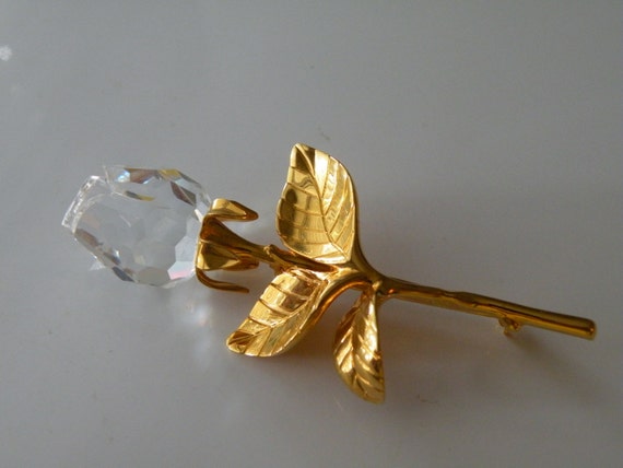 Swarovski rose flower brooch pin. Swan logo.