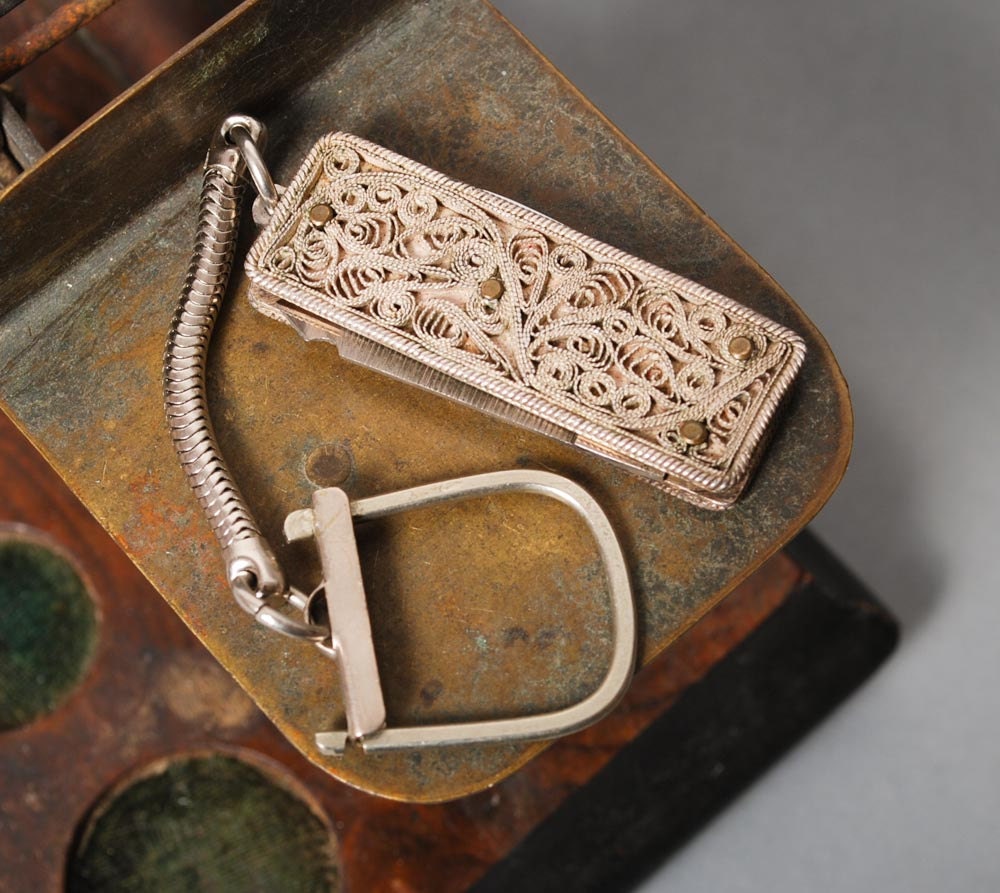 Vintage small metal folding knife nail file with filigree