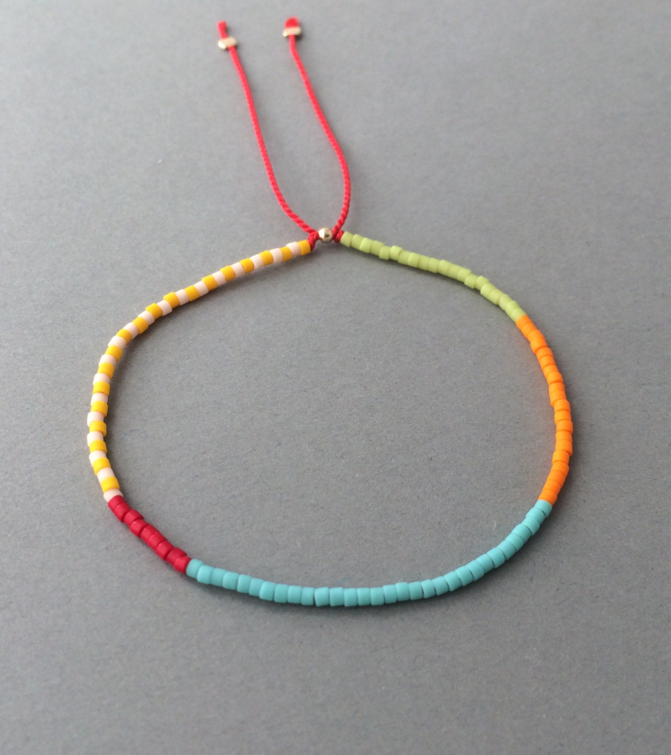 Adjustable Colorful Seed Bead Bracelet available in gold rose