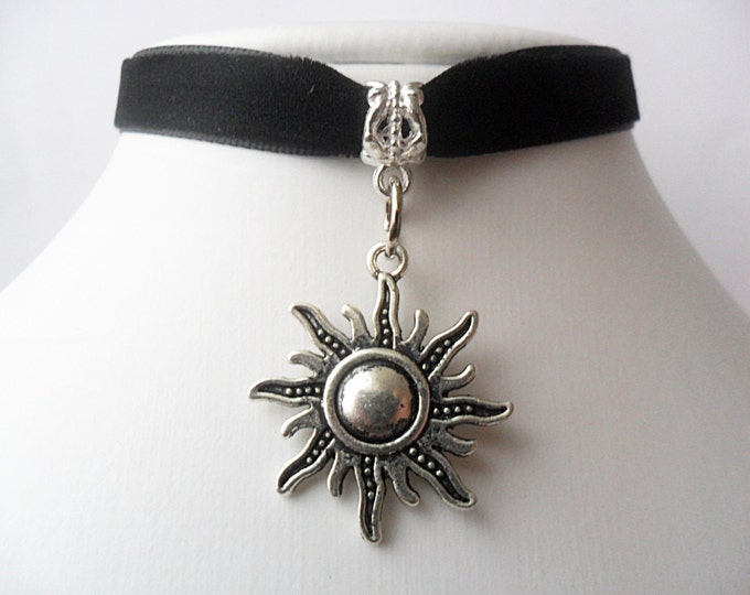 Velvet choker necklace with silver tone sun fire pendant and a width of 3/8”Black, Leon, Mathilda, Natalie Portman Ribbon Choker Necklace