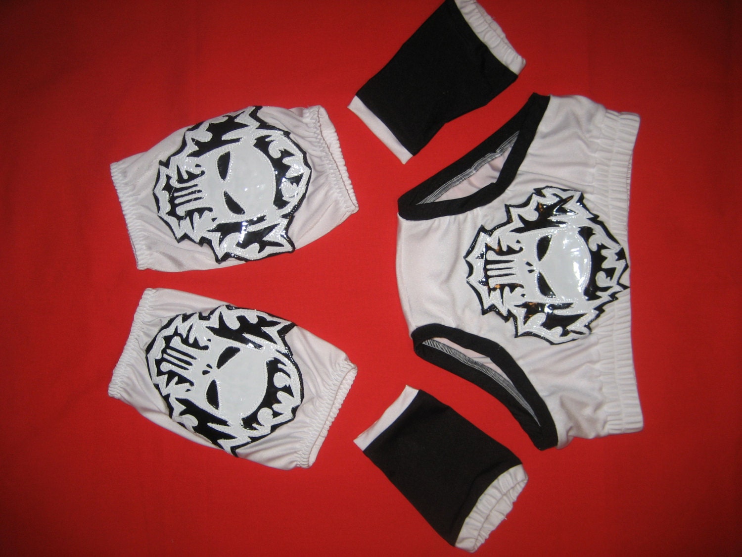 Pro wrestling trunks knee pad covers and wrist covers with