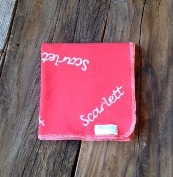 Items similar to Hand stamped personalized name jersey knit swaddling