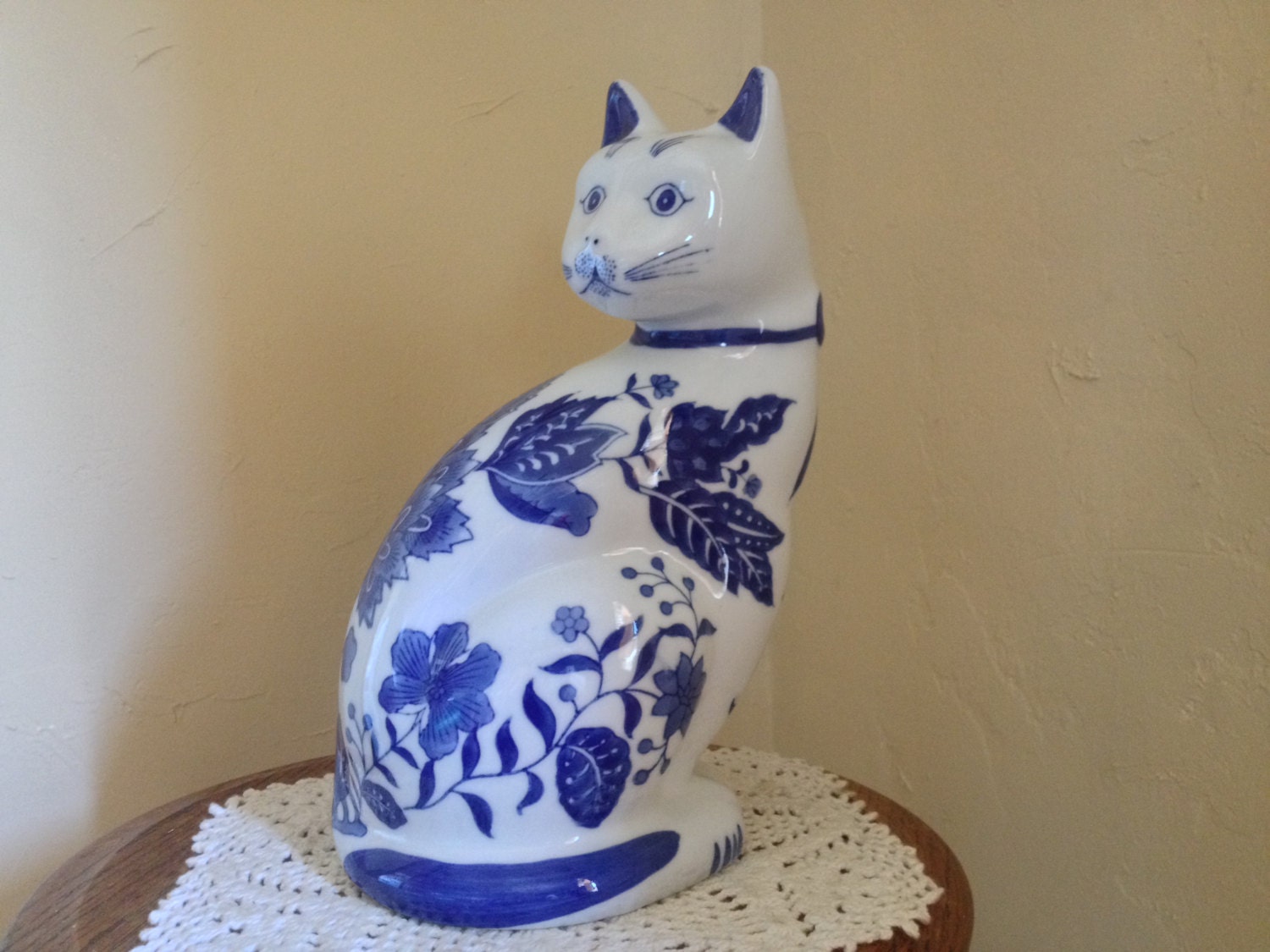 blue ceramic cat figurine