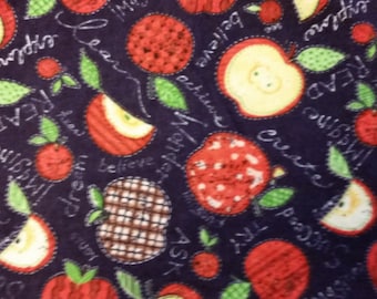 100 % Cotton Flannel Featuring Apples on a Dark Blue Background- By the Yard