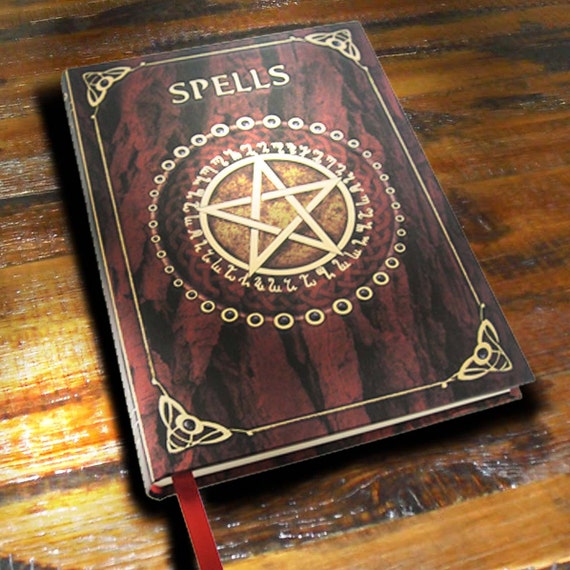 Handmade embossed spell journal.